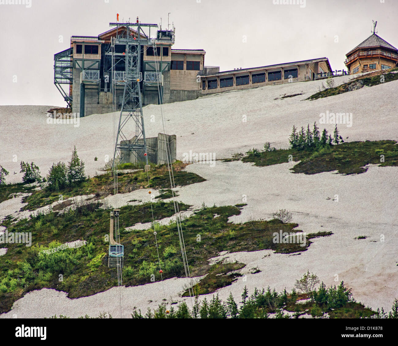 June 30, 2012 - Girdwood, Alaska, US - 60-passenger aerial trams of the Alyeska Resort Aerial Tramway are seen taking 26 mph scenic rides to and from the Mt Alyeska Upper Tram Terminal, 2,334 ft (711 m) above sea level, with its interconnected buildings housing the Roundhouse, a cafeteria, museum and the Seven Glaciers 4-star restaurant and bar. Part of the Chugach Mountain Range, located in Girdwood, Alaska, 27 mi (44Â km) from Anchorage, Mt. Alyeska is the biggest ski mountain in the state. (Credit Image: © Arnold Drapkin/ZUMAPRESS.com) Stock Photo