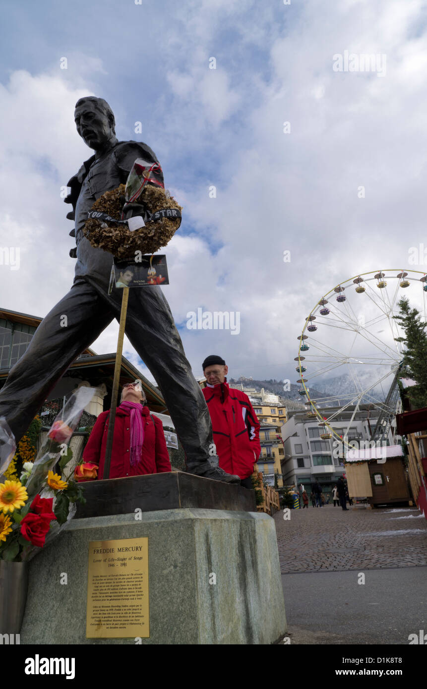 Tourists admiring Freddie Mercury statue and memorial in Montreux, Switzerland Stock Photo