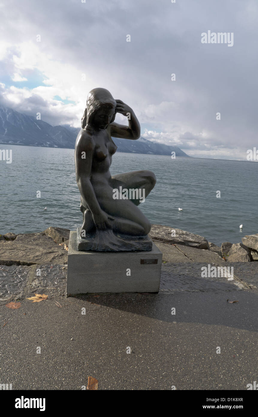 Baigneuse, a sculpture of a swimmer on the shore of Lake Geneva at Veytaux, Switzerland Stock Photo