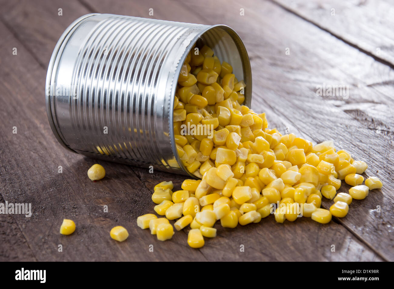 Canned Corn on wooden background Stock Photo