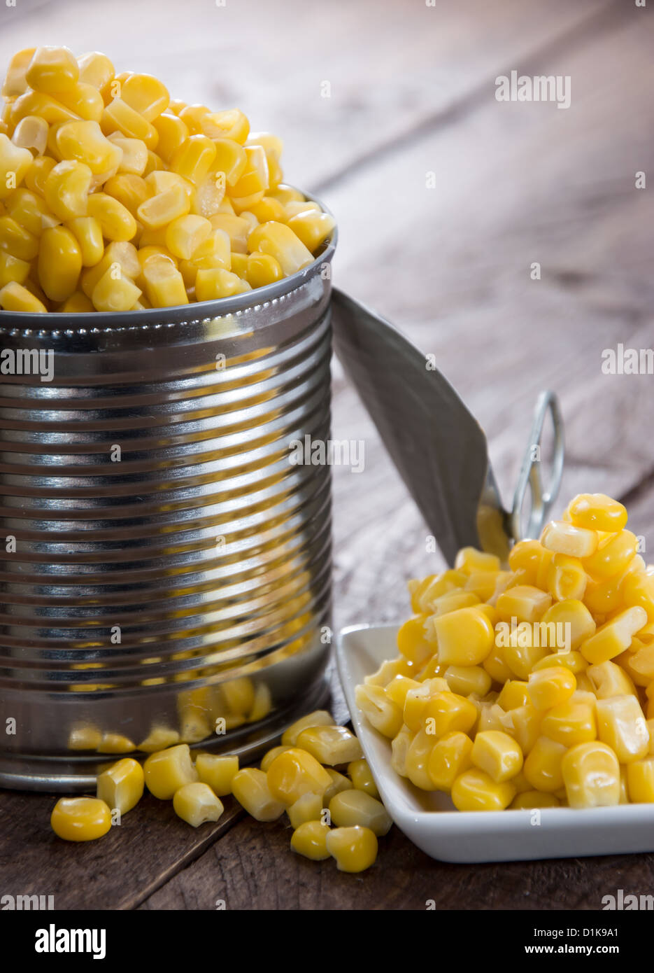 Canned Corn on a wooden background Stock Photo