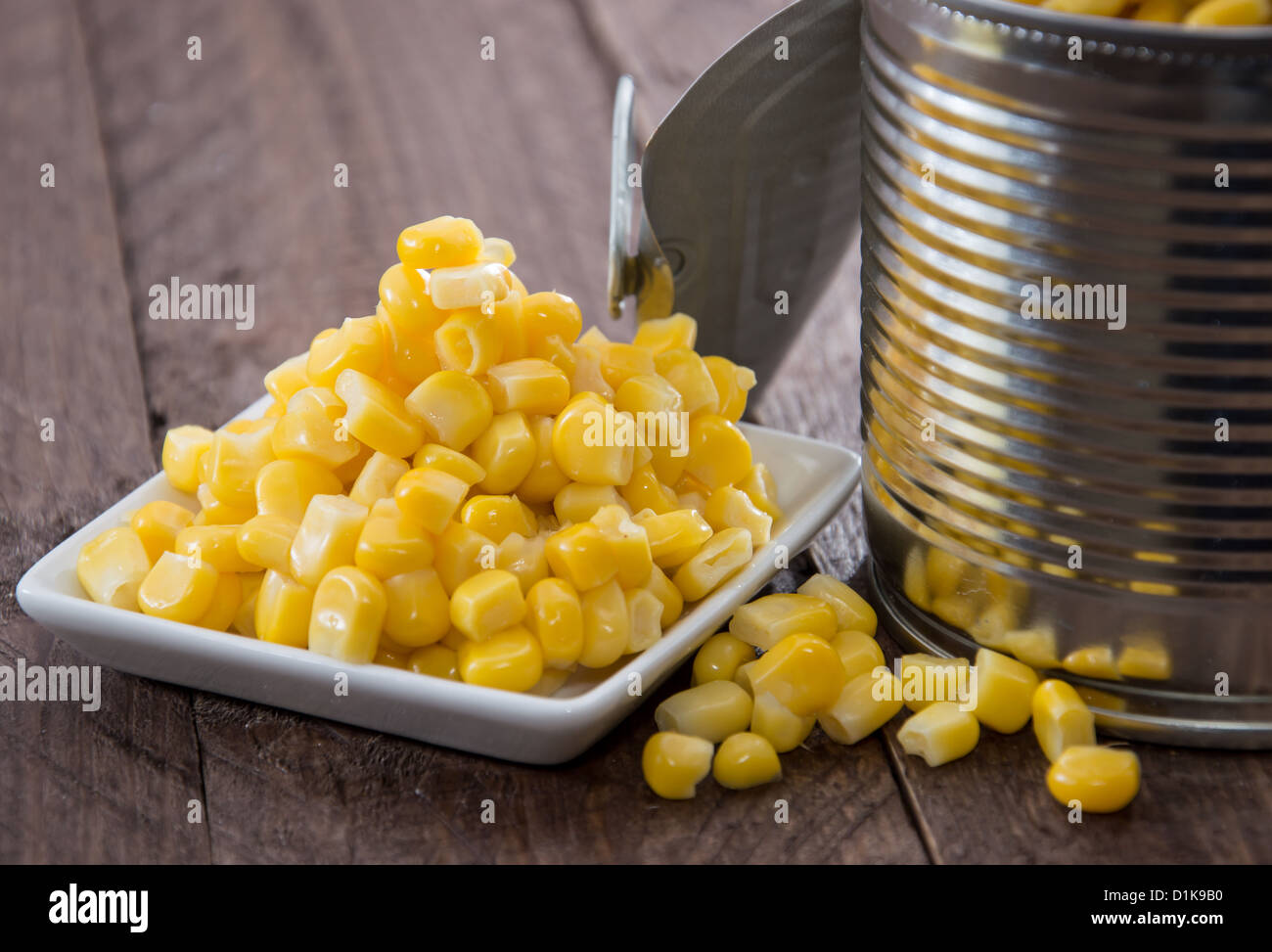 Canned Corn on wooden background Stock Photo