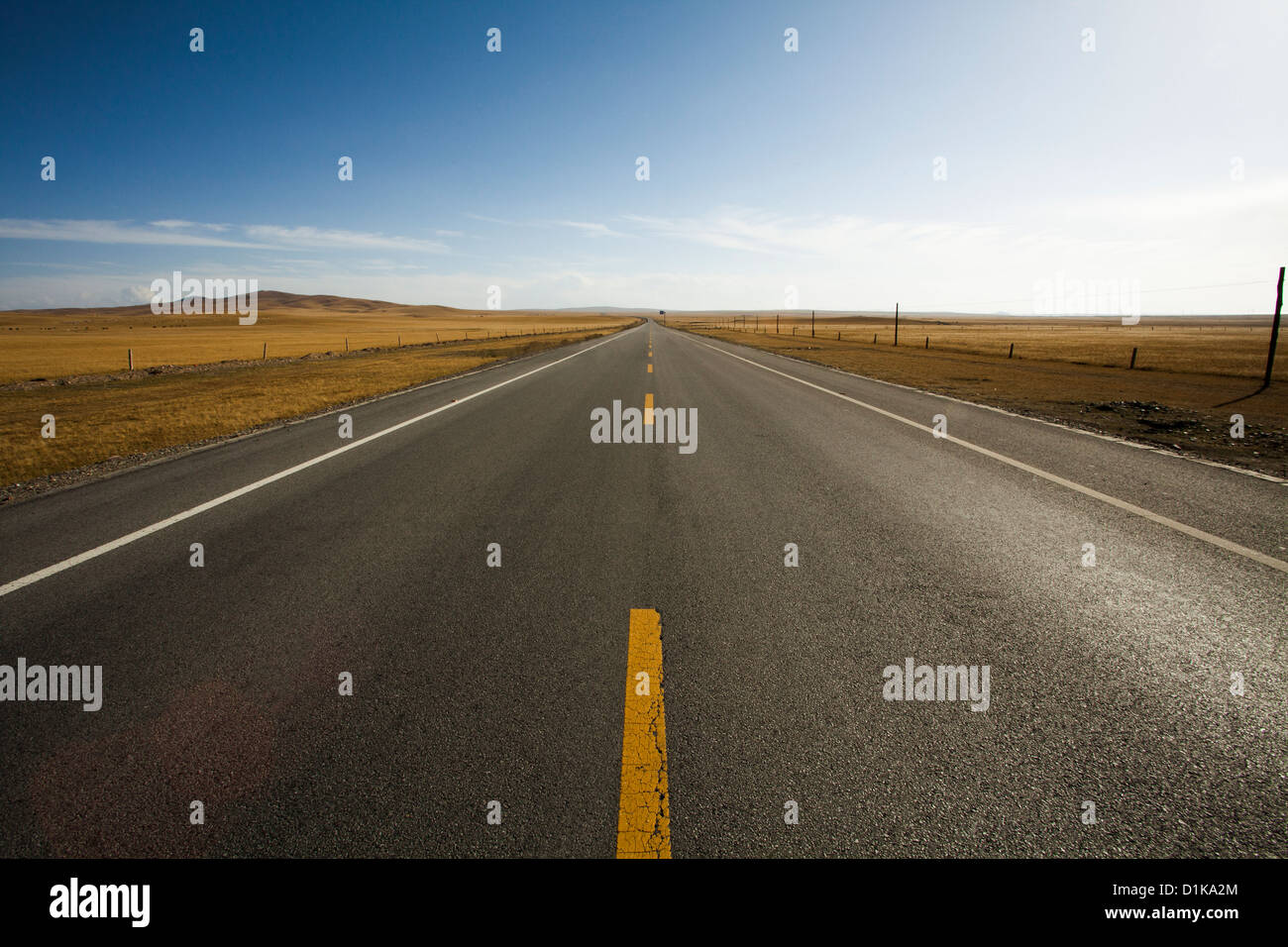 Highway leading through the wilds in Qinghai province, China Stock ...
