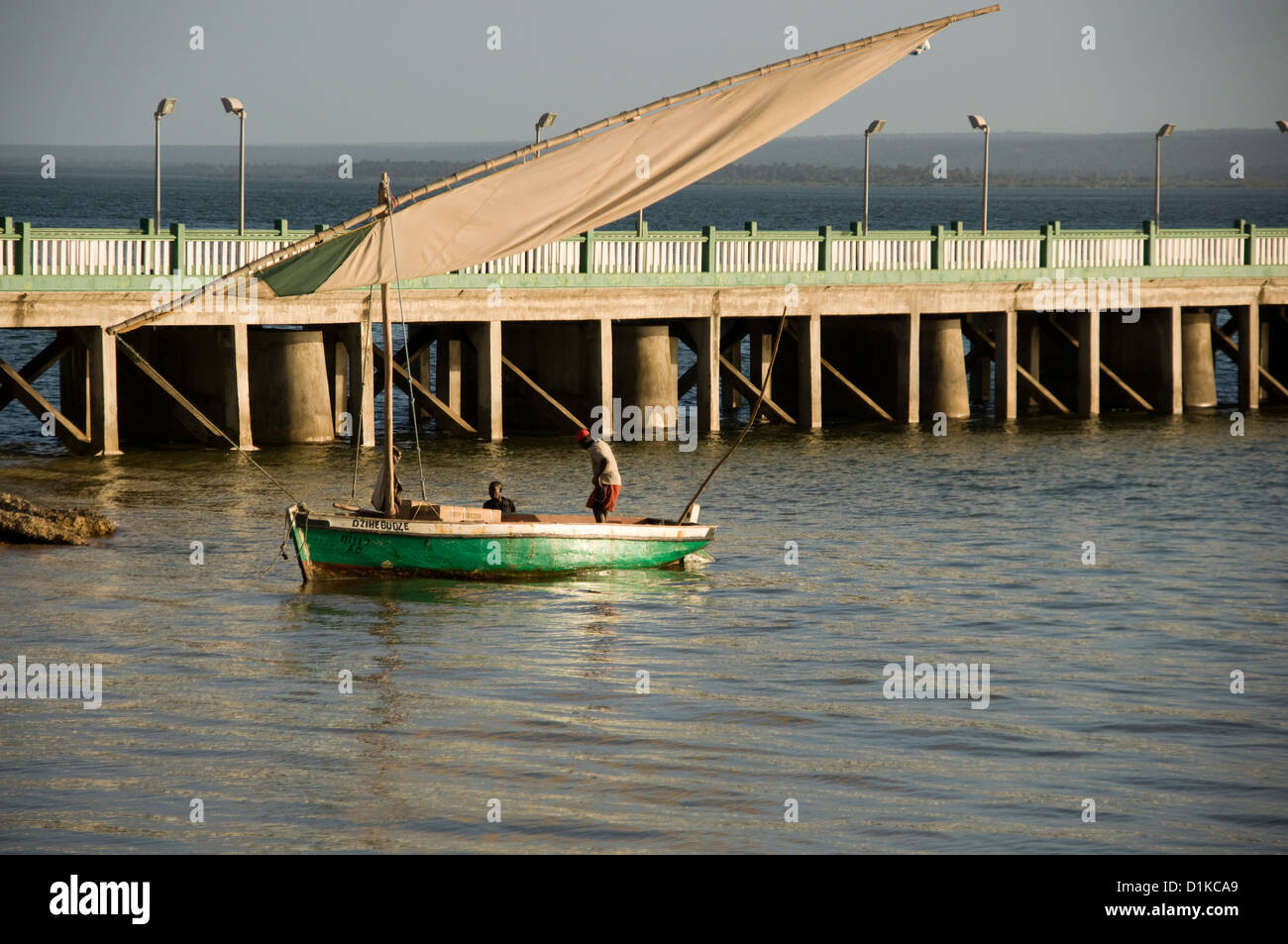 Dhow arriving at Inhambane pier. Stock Photo