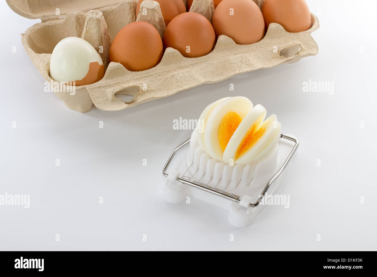 Egg Slicer And Boiled Eggs On The Saucers Closeup Stock Photo - Download  Image Now - Meat Slicer, Egg - Food, Bamboo - Material - iStock