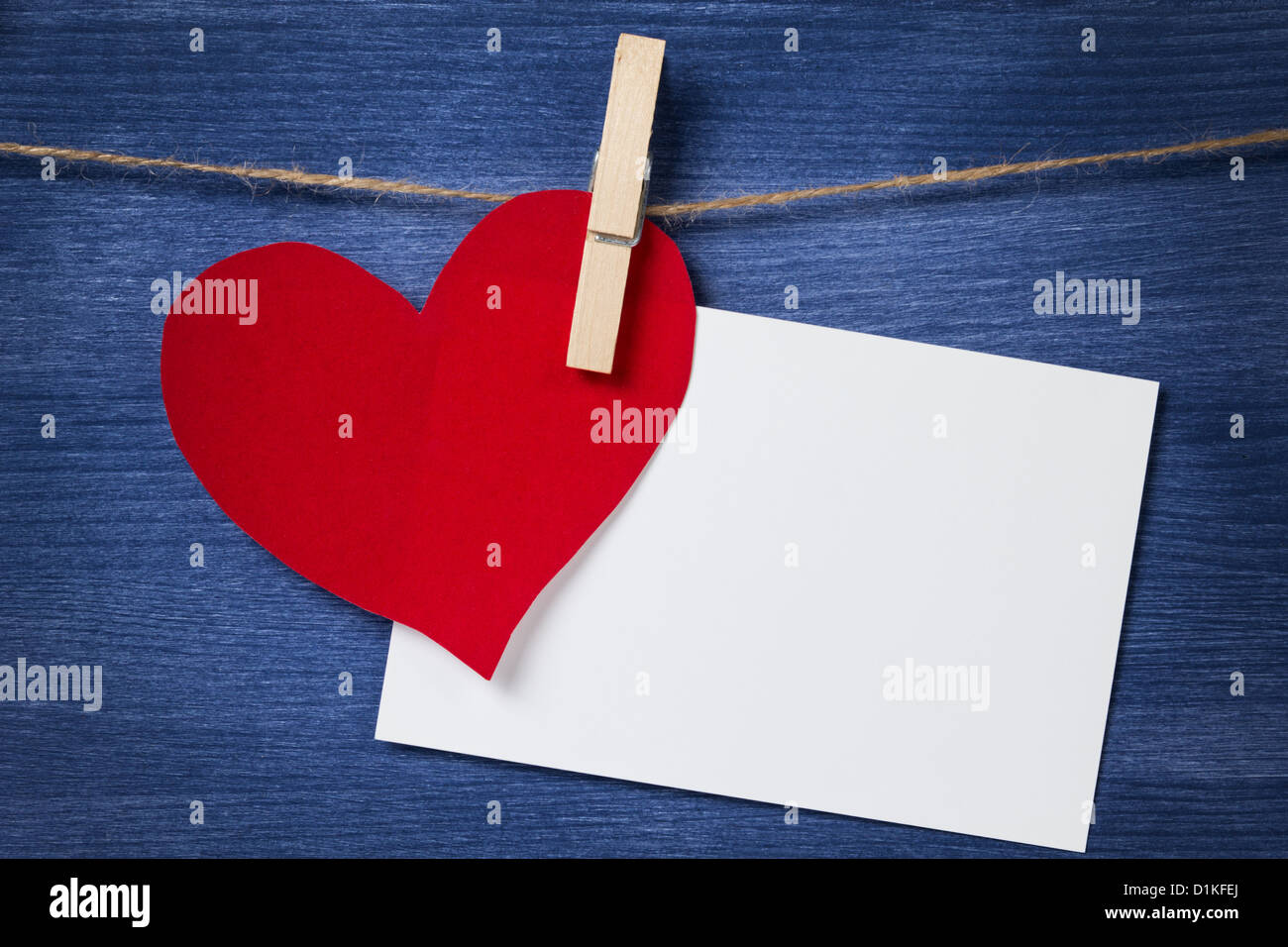 paper heart and card hanging on a rope, valentines day theme Stock ...