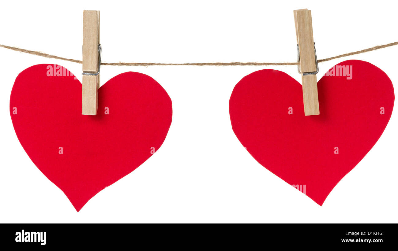 two red paper hearts hanging, isolated on white Stock Photo - Alamy