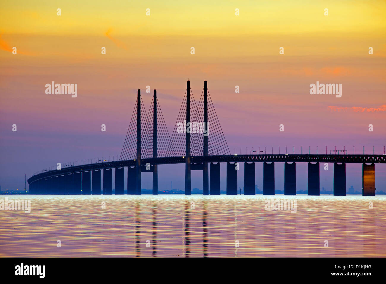 Öresund / Øresund Bridge, railway and dual carriageway bridge-tunnel between Denmark and Sweden at sunset, Scandinavia Stock Photo