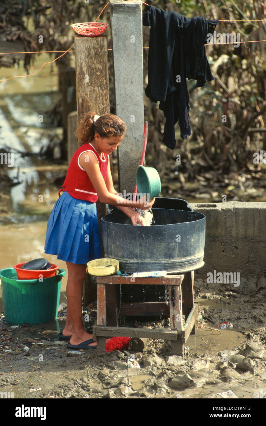 Girl washing laundry in a village in Honduras, Central America Stock Photo Alamy
