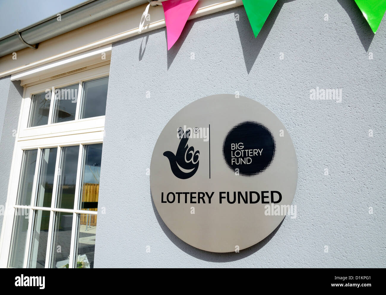 a big lottery fund sign on building at the heartlands centre in redruth, cornwall, uk Stock Photo