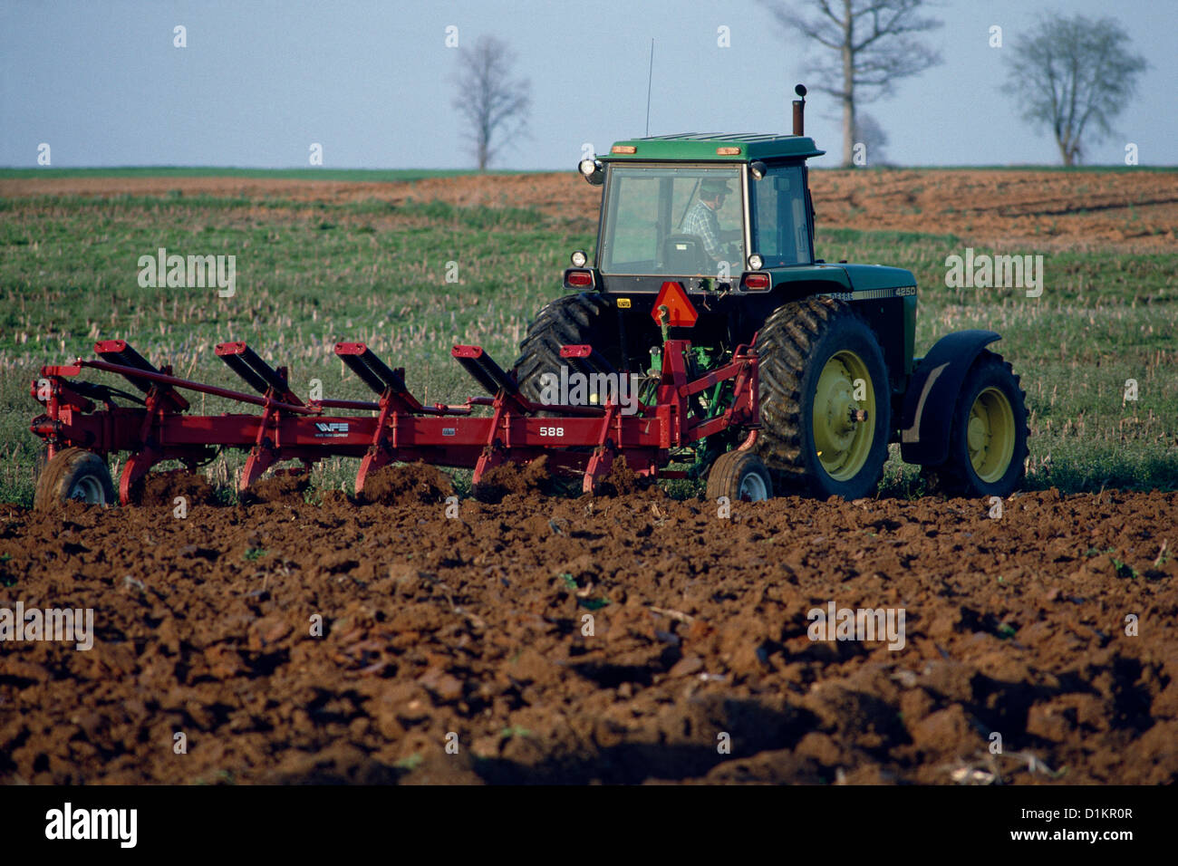 FARMING USING JOHN DEERE TRACTOR TO PLOW CORN STUBBLE, LANCASTER COUNTY