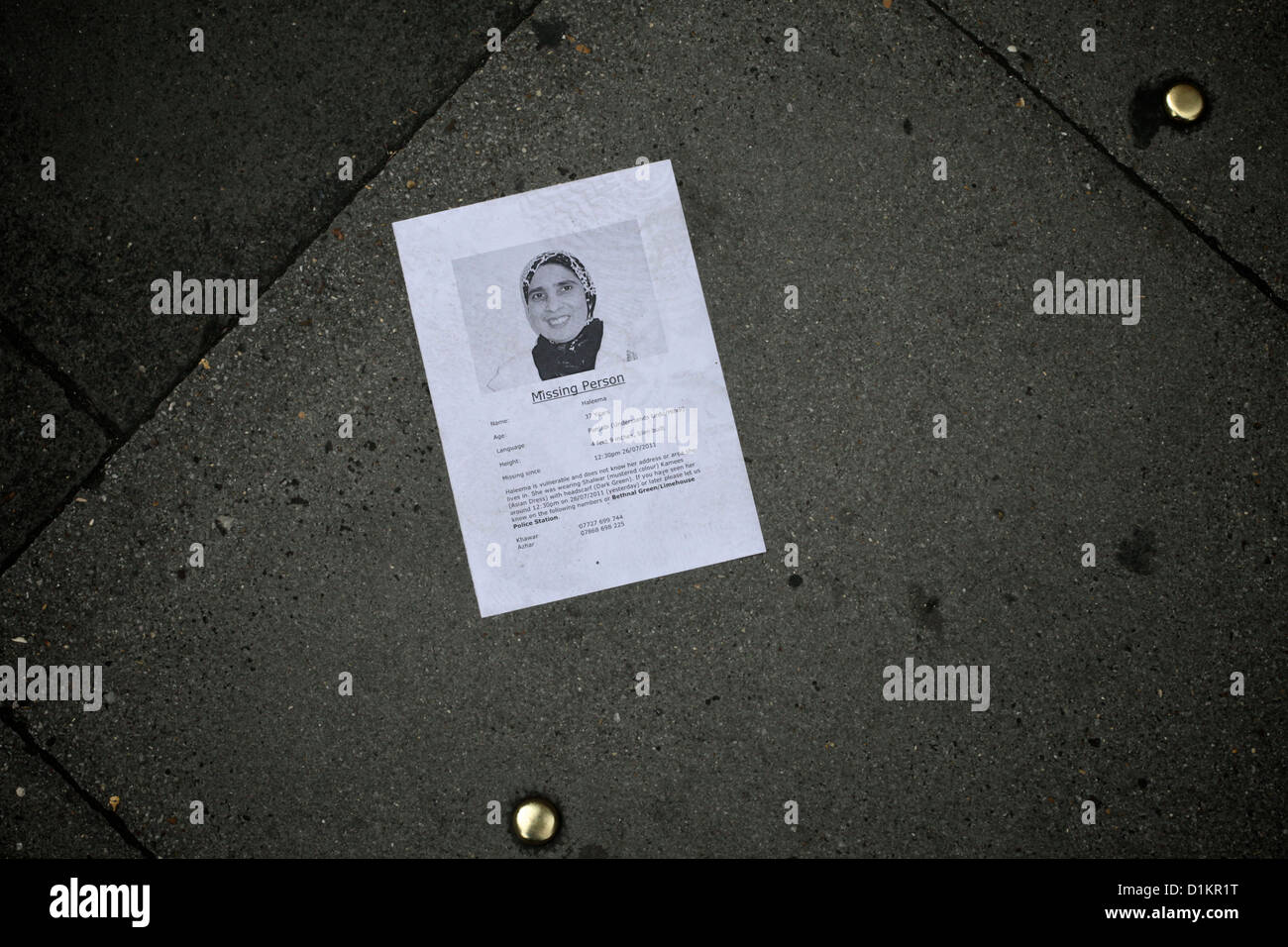 A dropped leaflet for a missing person, Shepherd's Bush, London, UK Stock Photo
