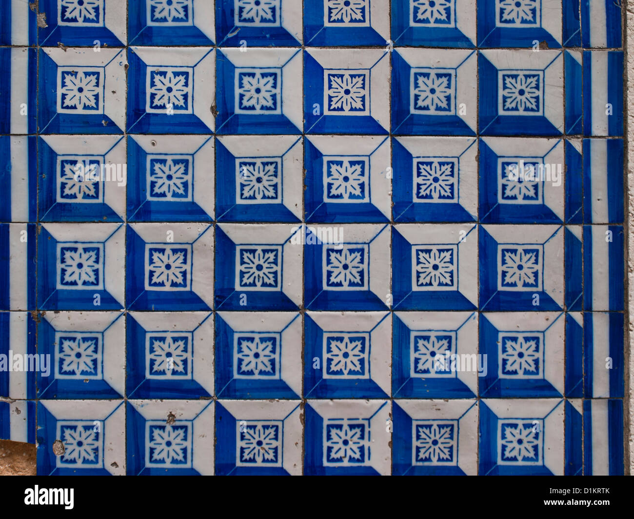 Traditional tiles from a Lisbon building with blue and white geometric