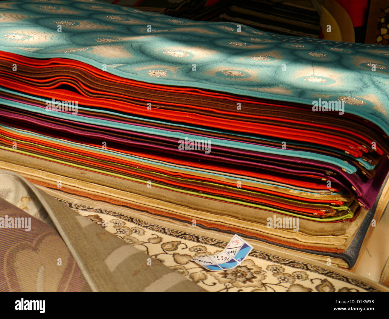 Colorful carpets on sale in Arabia Stock Photo Alamy