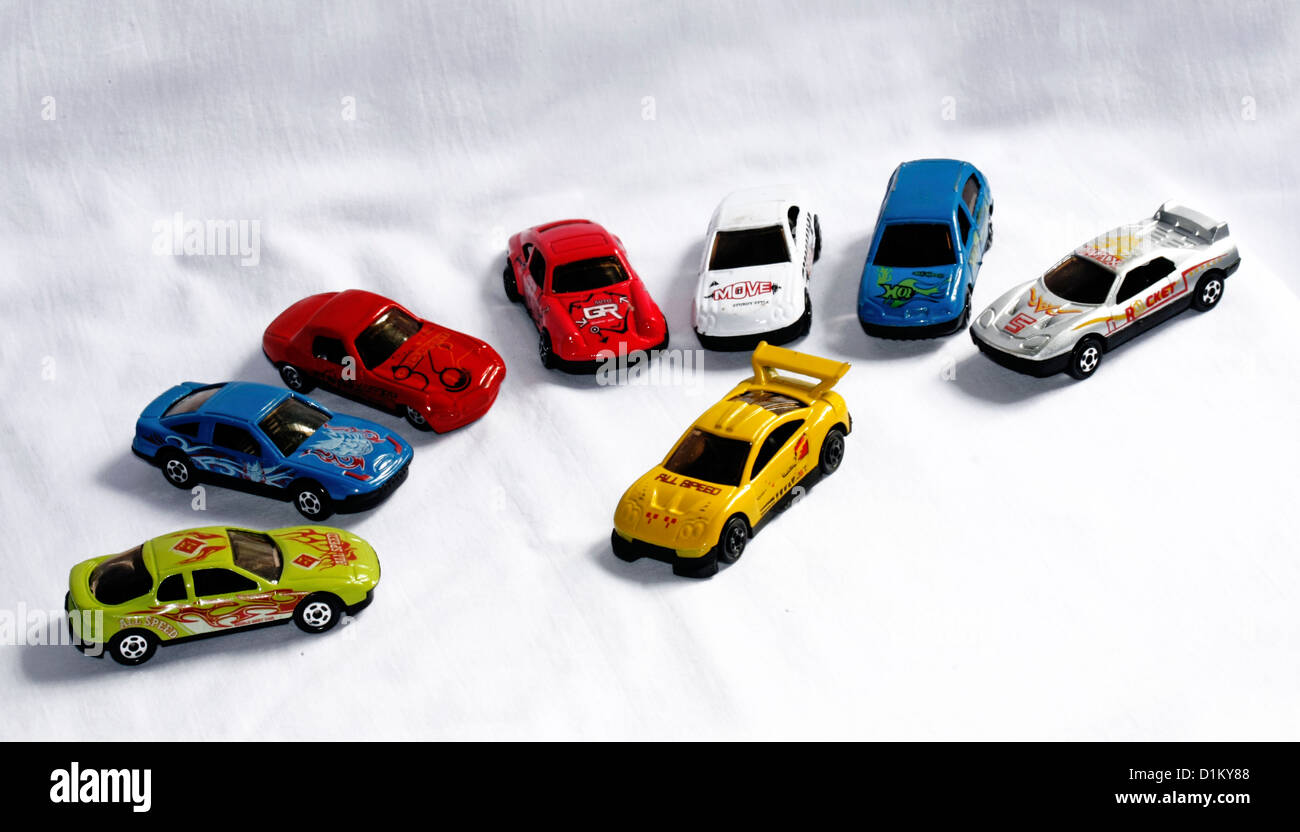 different concept meanings by toy car arrangement Stock Photo
