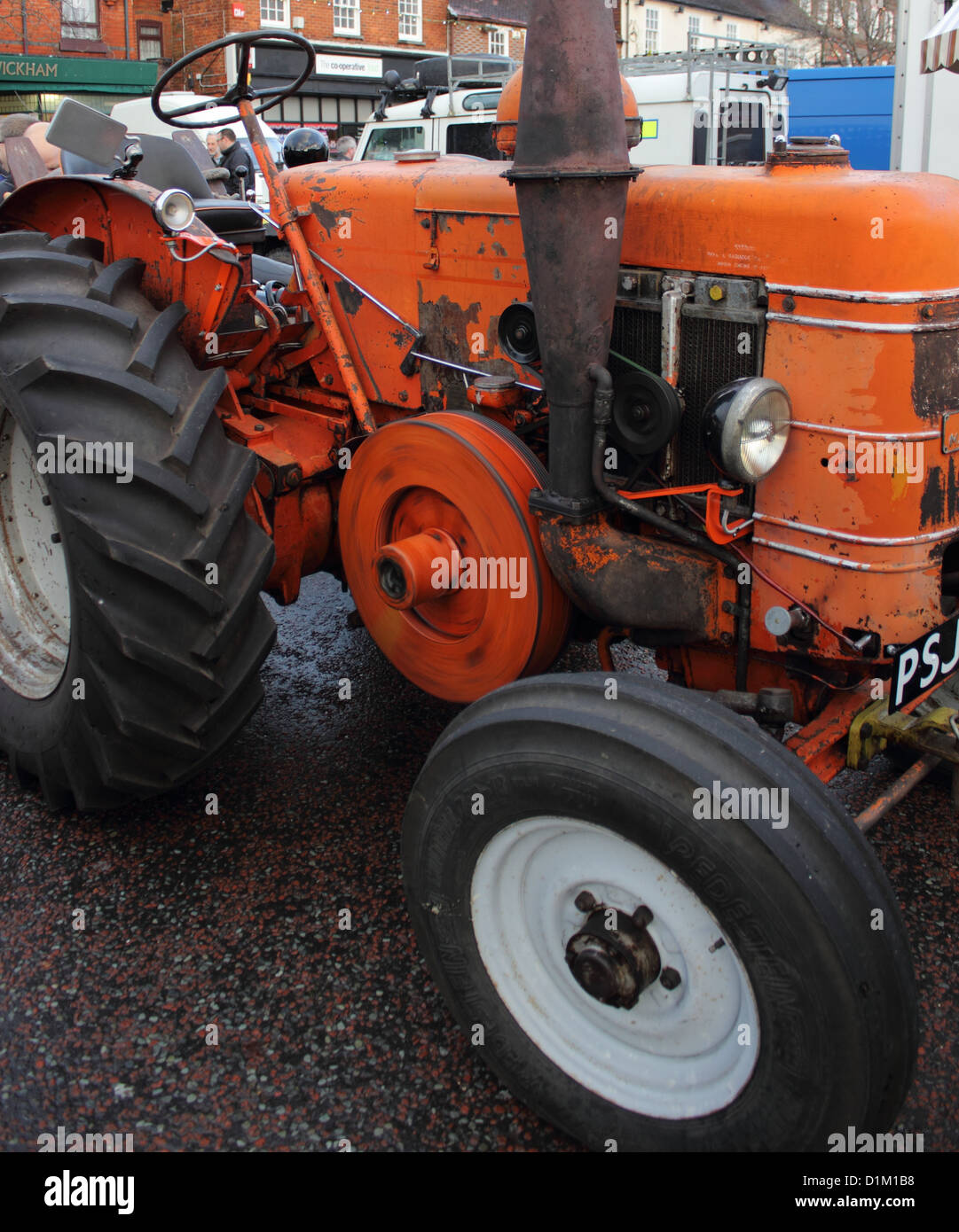 an old retro tractor at a classic auto show Stock Photo