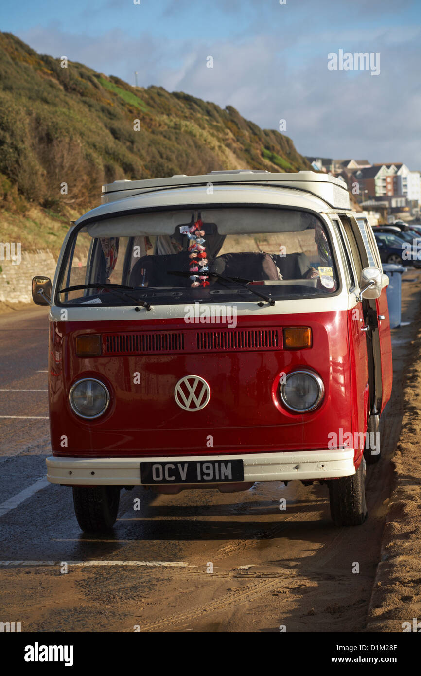 Volkswagen campervan parked along Boscombe promenade on Christmas day at Bournemouth, Dorset UK in December Stock Photo