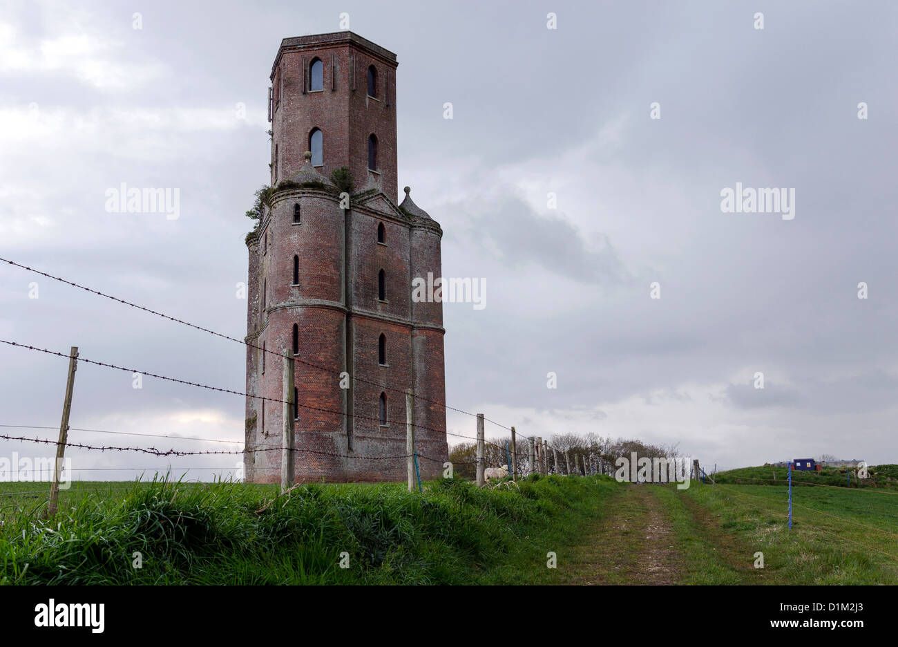 A five storey 43 metres high gothic red brick observatory / folly designed by Humphrey Sturt in the 18th century. Stock Photo