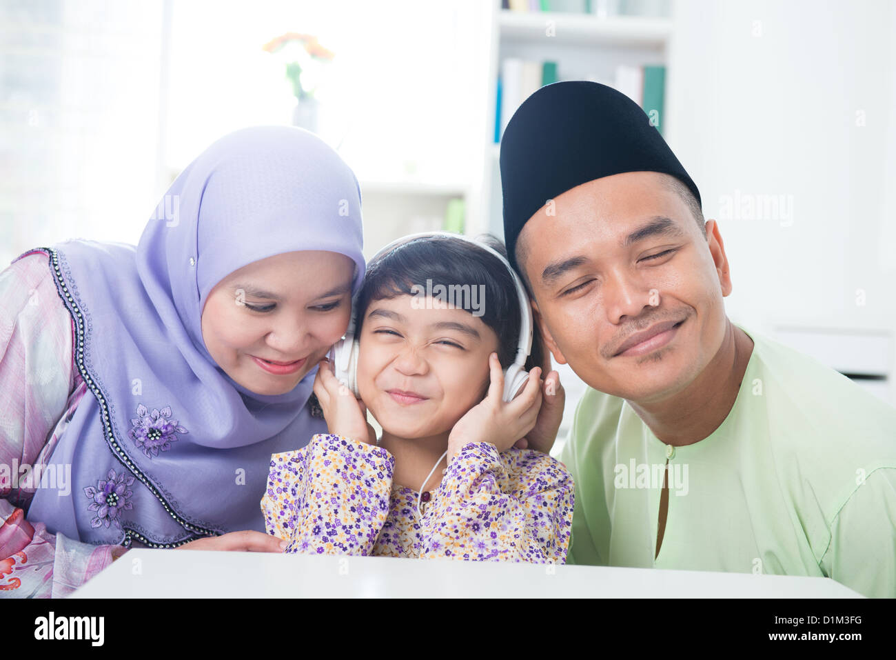 Southeast asian family listen mp3 hi-res stock photography and images -  Alamy