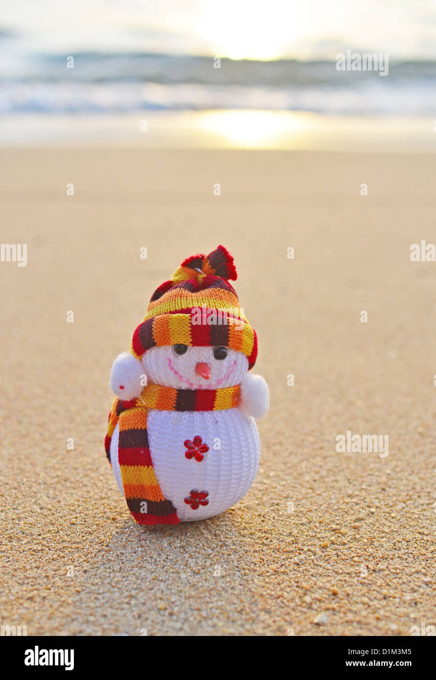 funny snowman on the beach Stock Photo