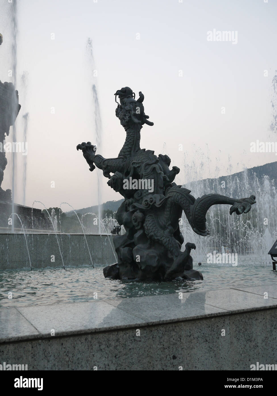 bronze dragon statue water fountain Stock Photo Alamy