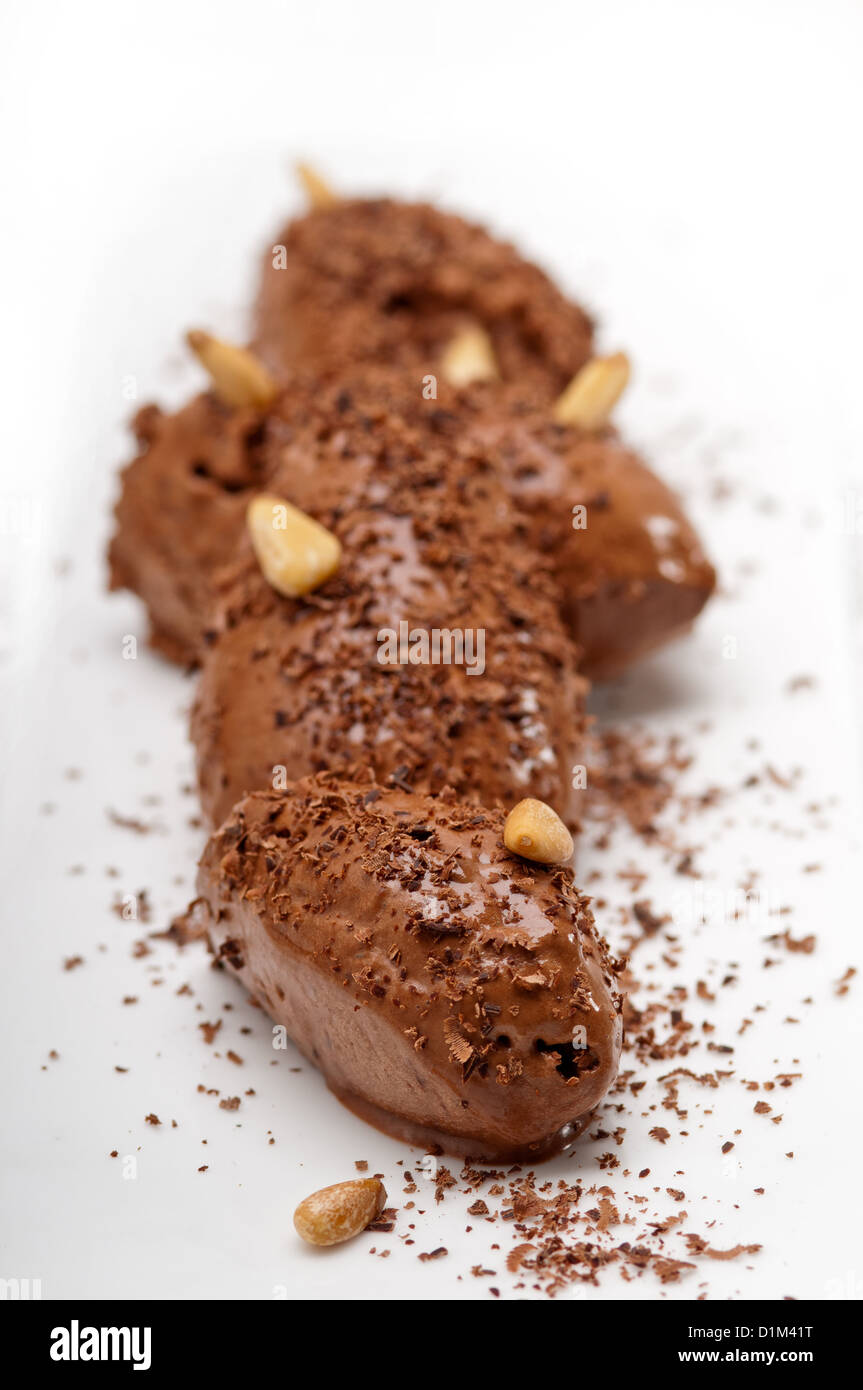 fresh home made chocolate mousse quenelle dessert Stock Photo Alamy