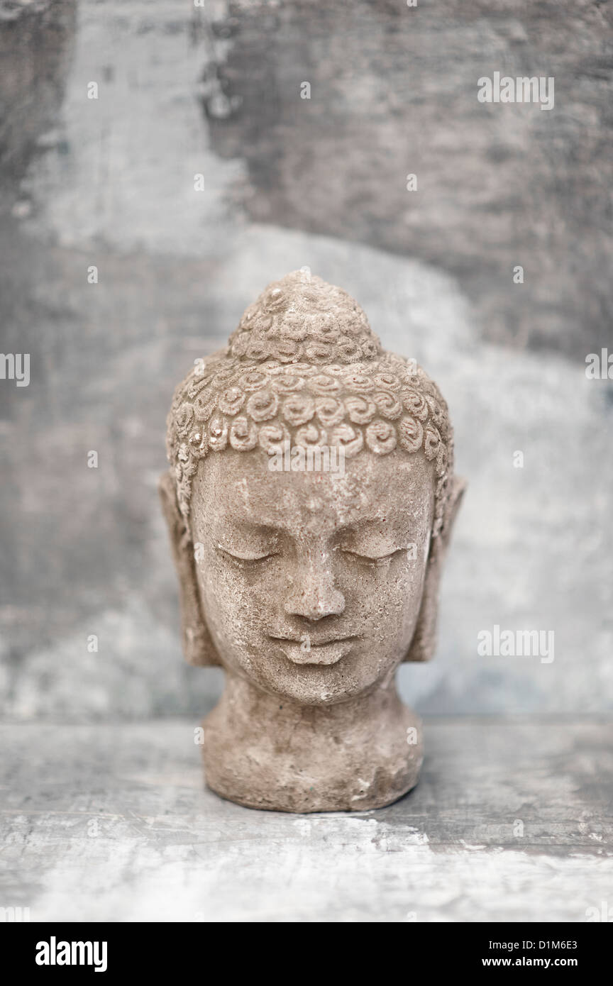 Stone Buddha head sculpture photographed in studio Stock Photo Alamy