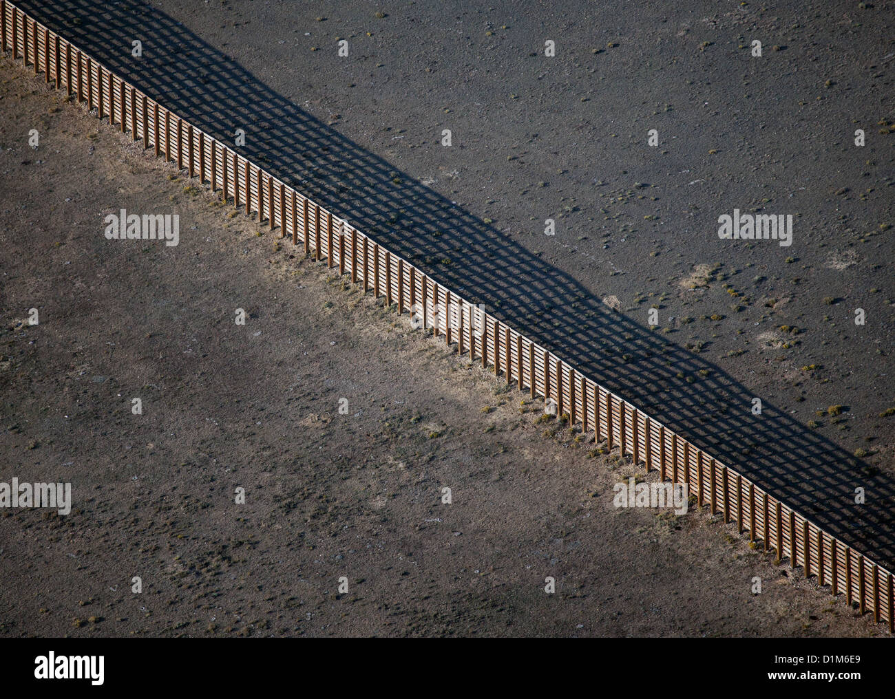 aerial photograph snow fence protecting interstate I 80 southern Wyoming Stock Photo
