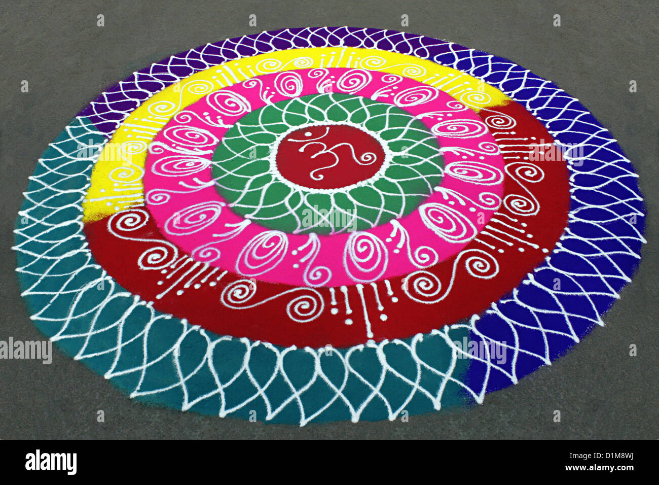 Colorful rangoli, circular designs on the floor during ganesh ...