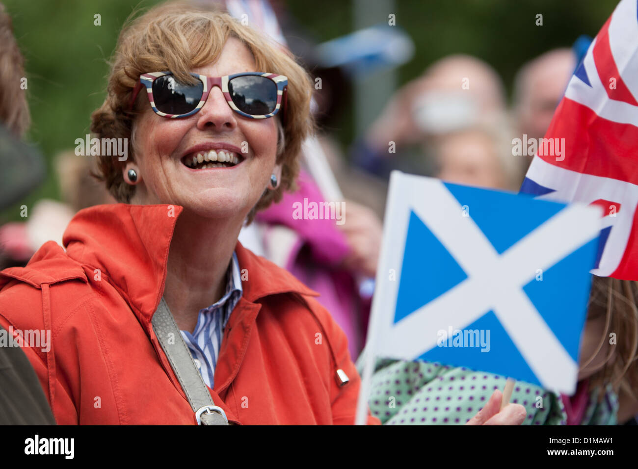 Scottish Saltire St. Andrew's flag, during the Olympic HomeComing Parade for 2012 Scottish Olympic medalists, Glasgow, Scotland Stock Photo