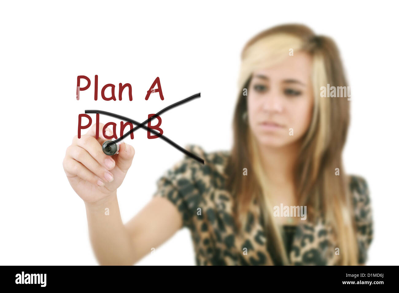 Business plan strategy changing. Woman crossing over Plan A, writing Plan B. Beautiful young smiling businesswoman sketching on Stock Photo