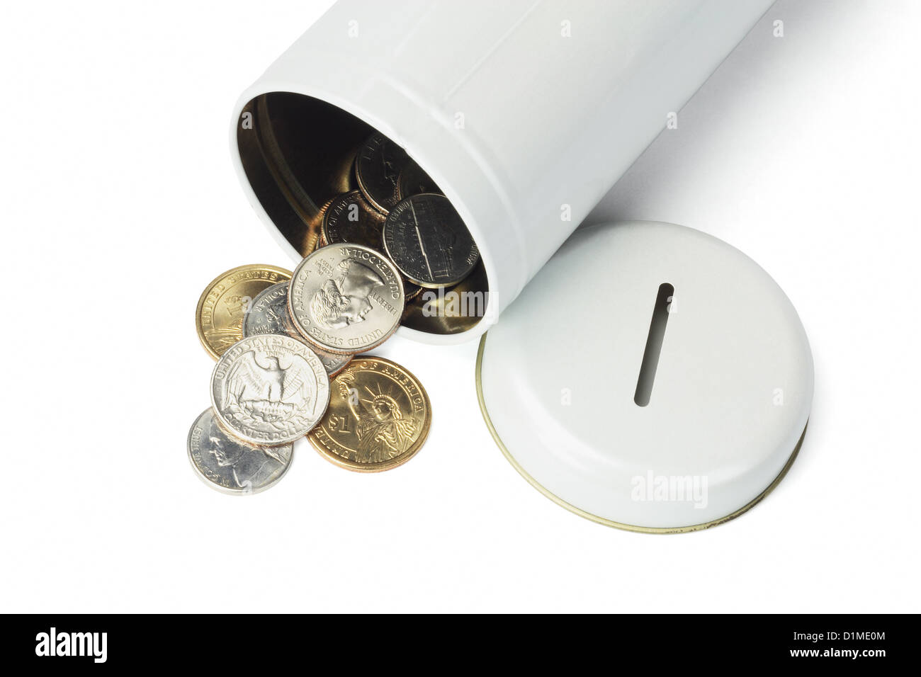 Coins Spilled Out From Open Tin Can on White Background Stock Photo