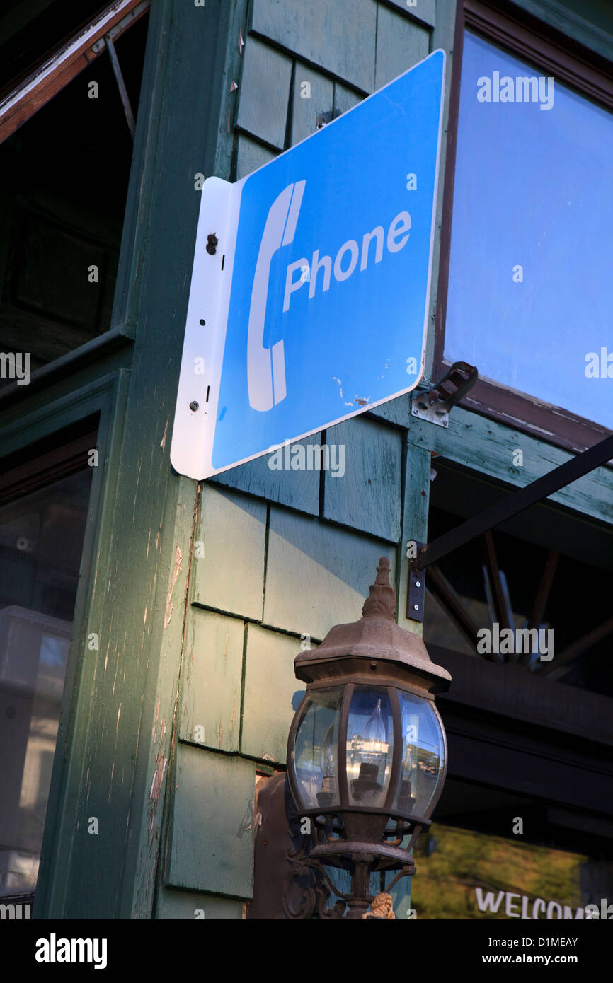 Sign for a public pay phone. Stock Photo