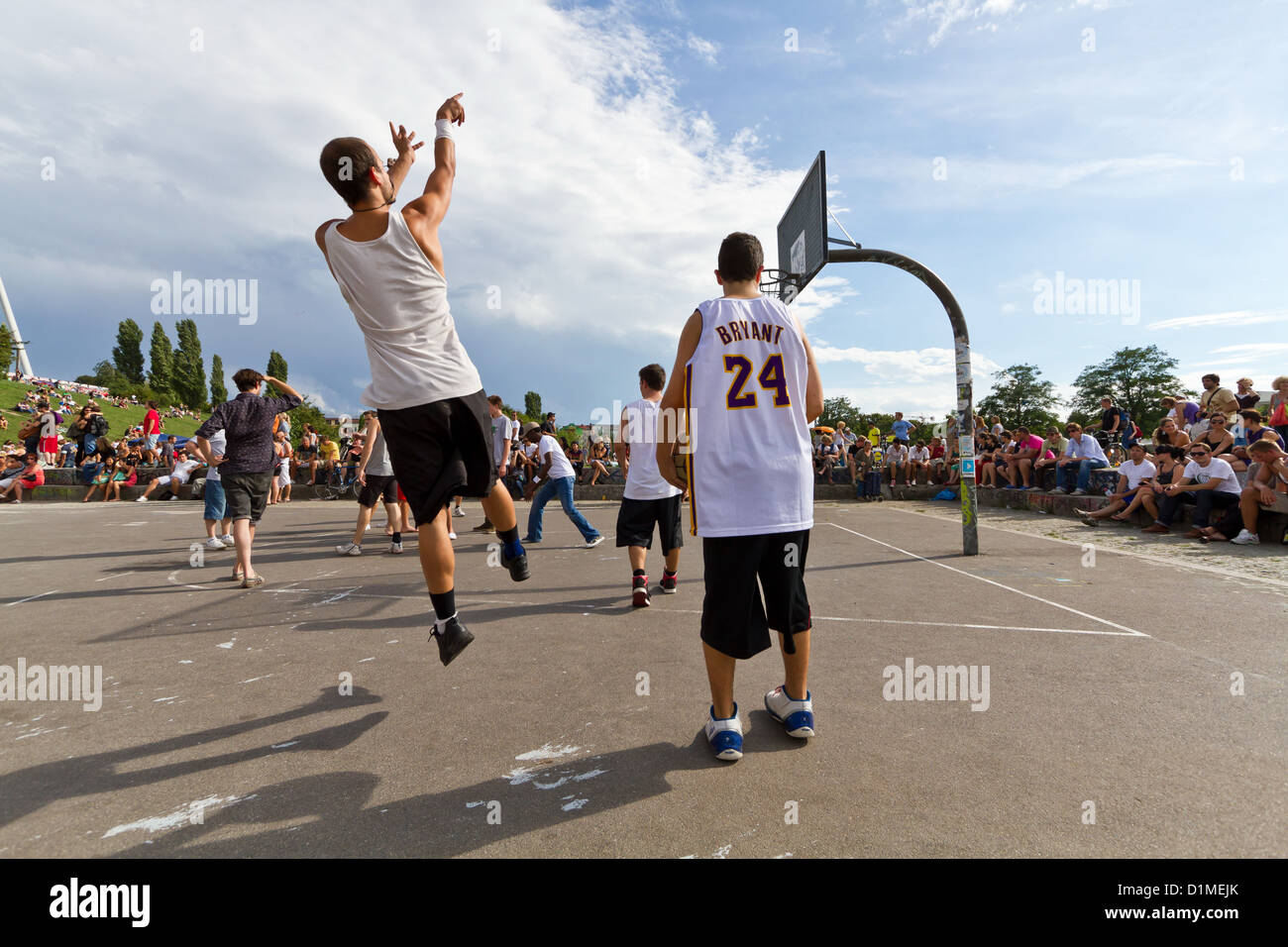 Young People playing Basketball in the Mauerpark in Prenzlauer Berg in ...