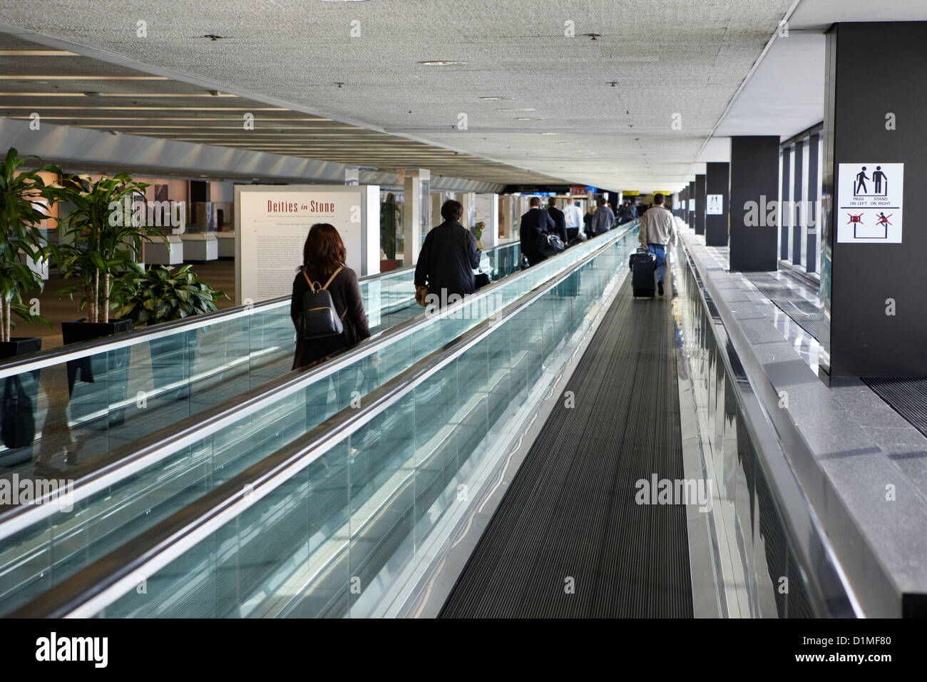 passengers on moving walkway at San Francisco International Airport California USA Stock Photo