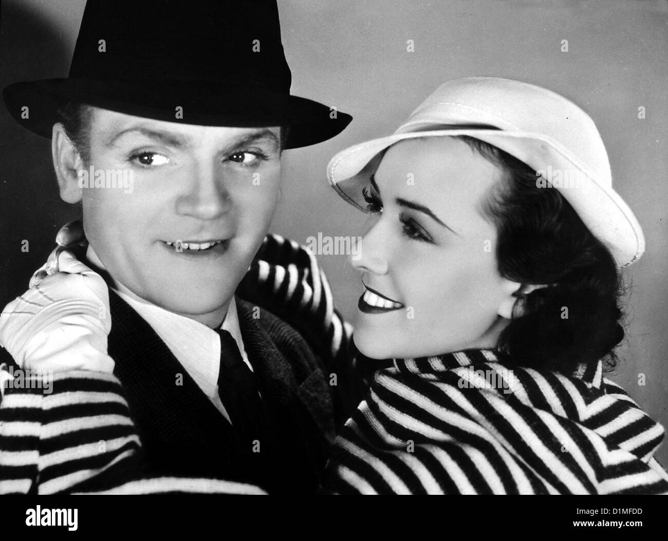 Der Fbi-Agent  G-Men,  James Cagney, Margaret Lindsay Dem angehenden Rechtsanwalt James 'Brick' Davis (James Cagney) wird von Stock Photo