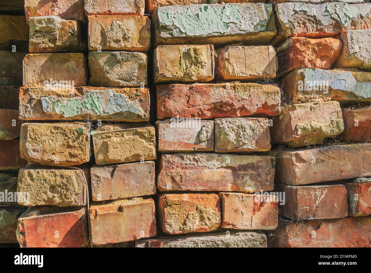 Viele Ziegelsteine übereinander gestapelt | Many bricks stacked Stock Photo