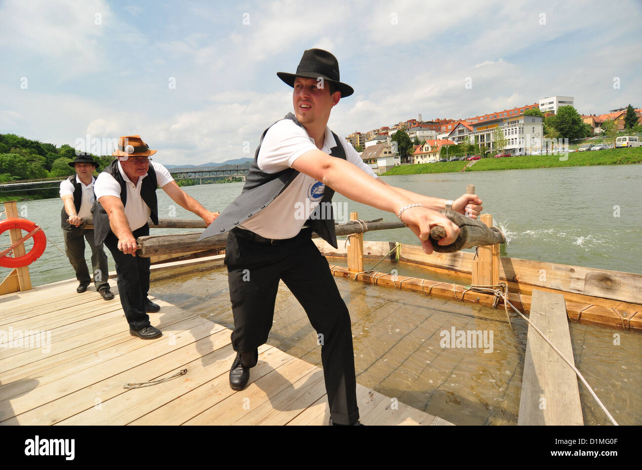 Pushing Raft Turning the raft on Drava river Stock Photo - Alamy