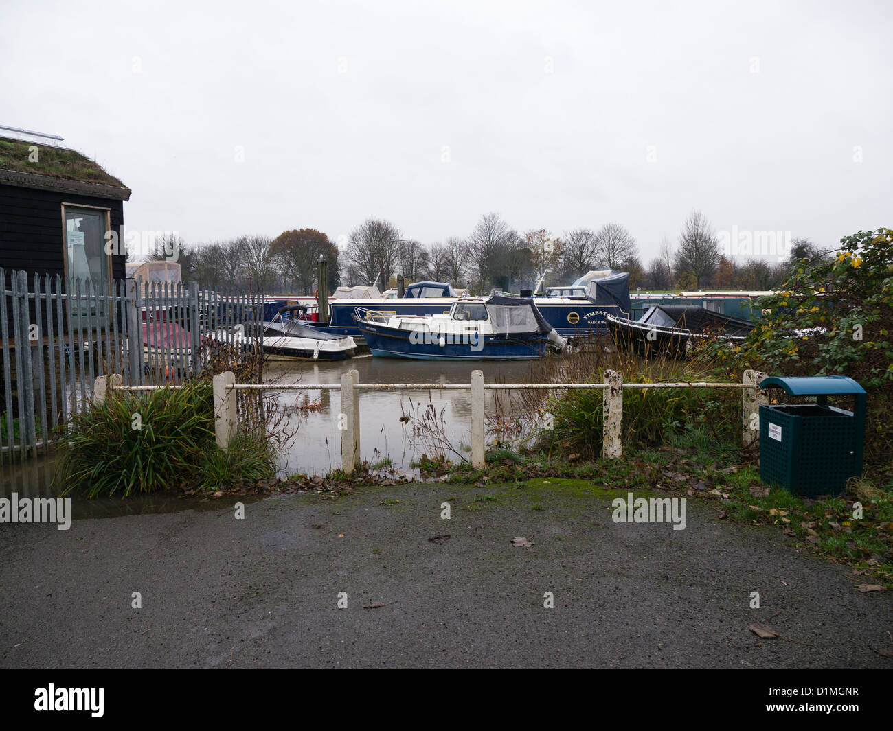 Boats moored at the end of the road in Thames Ditton, Surrey Stock