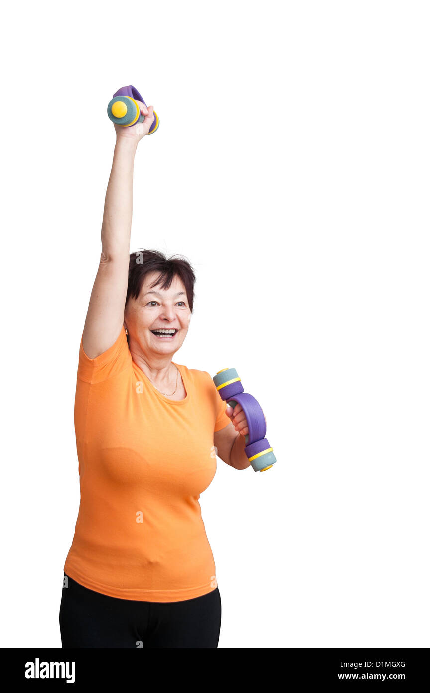 Smiling senior fitness woman excercising with barbells - isolated on white Stock Photo