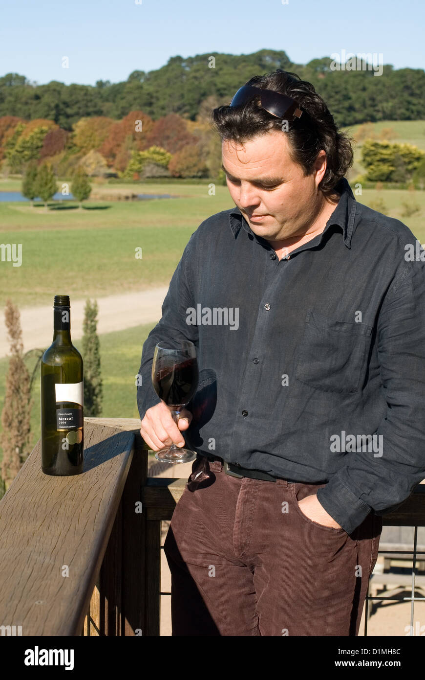 A winemaker sampling the finished product Stock Photo
