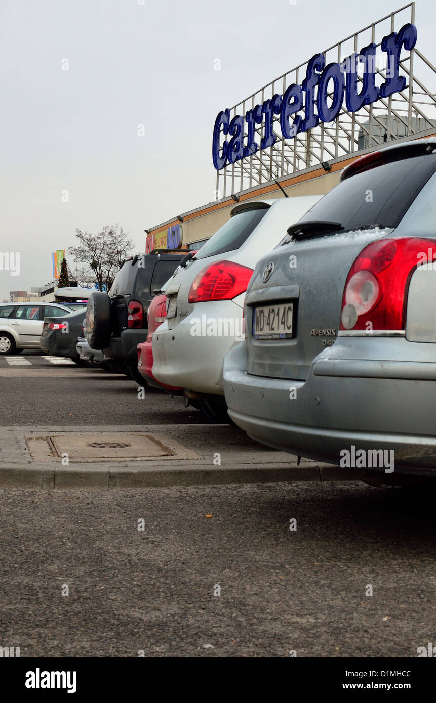 Cars in front of Carrefour supermarket on parking Stock Photo Alamy