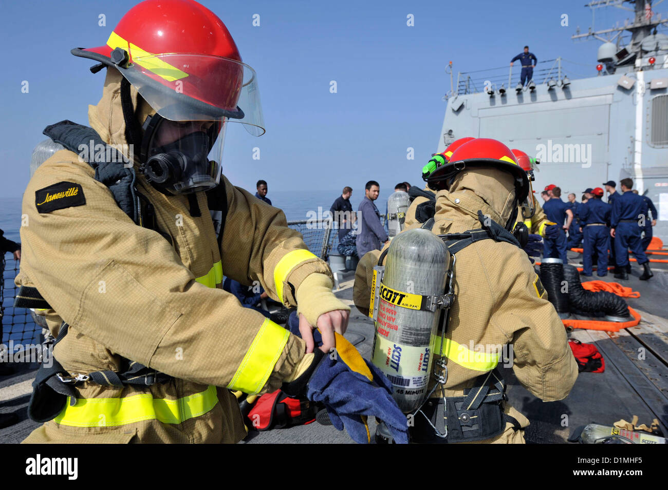 Hull Maintenance Technician Fireman Apprentice Cody Shay dons a Stock