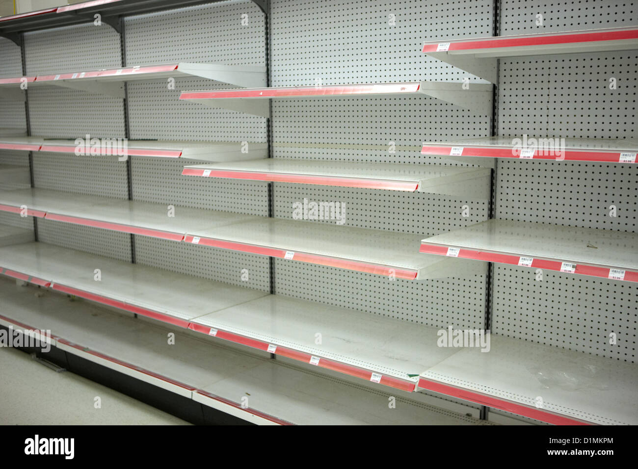 empty shelves in a supermarket as a result of liquidation Saskatoon Saskatchewan Canada Stock Photo