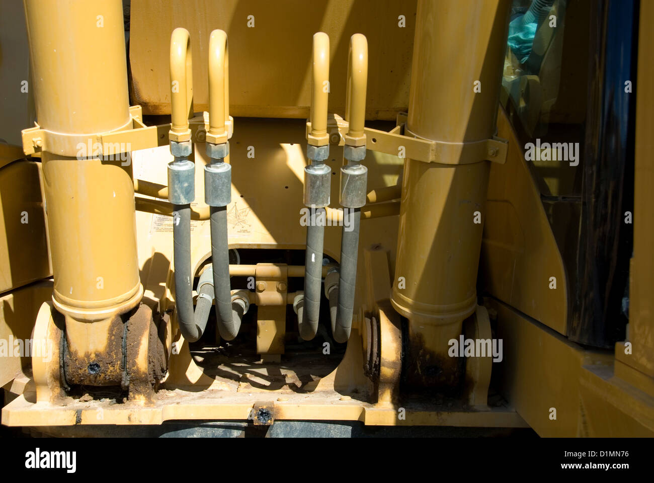 Hydraulic hoses on an excavator Stock Photo