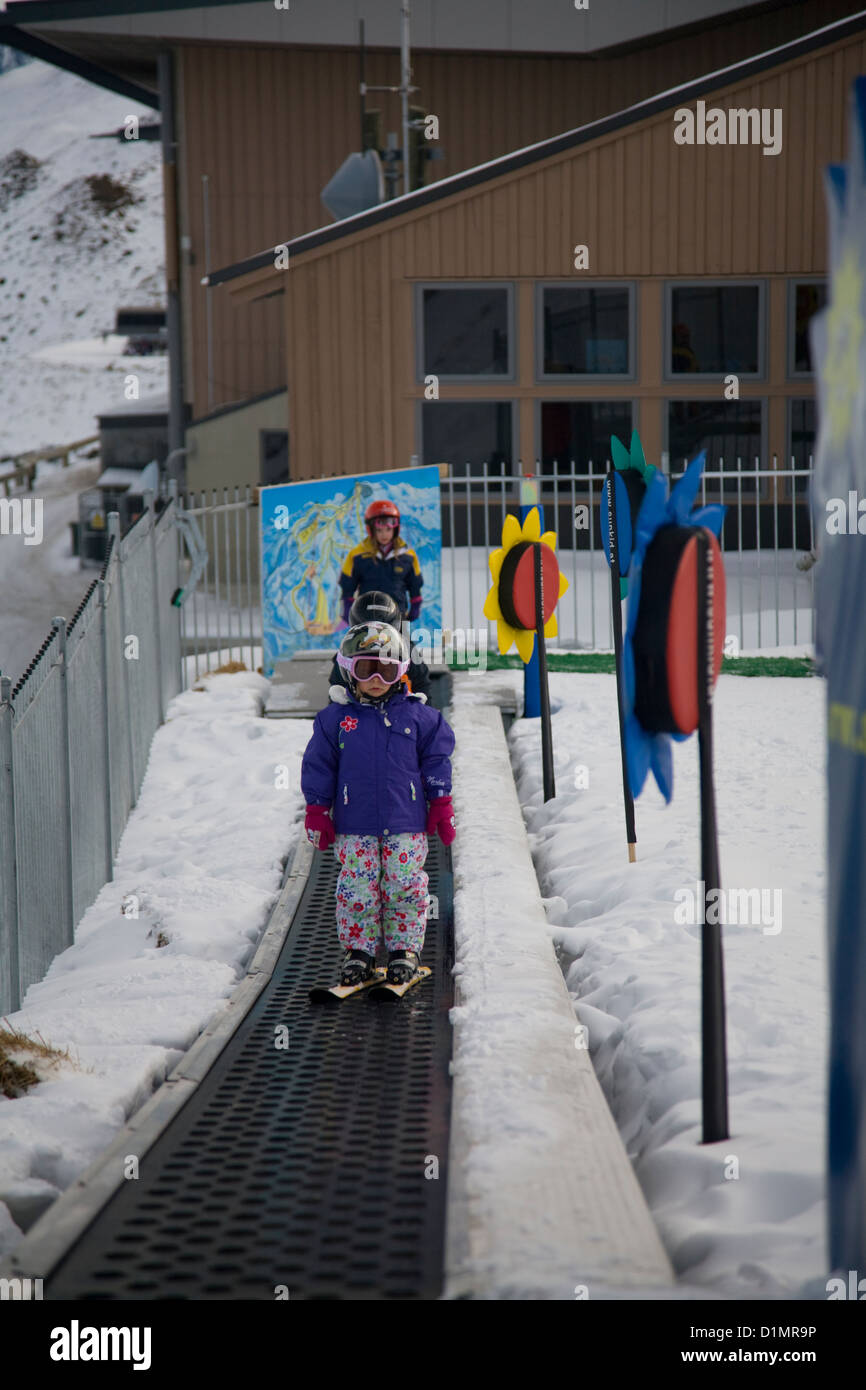 children learning to ski in queenstown,new zealand Stock Photo