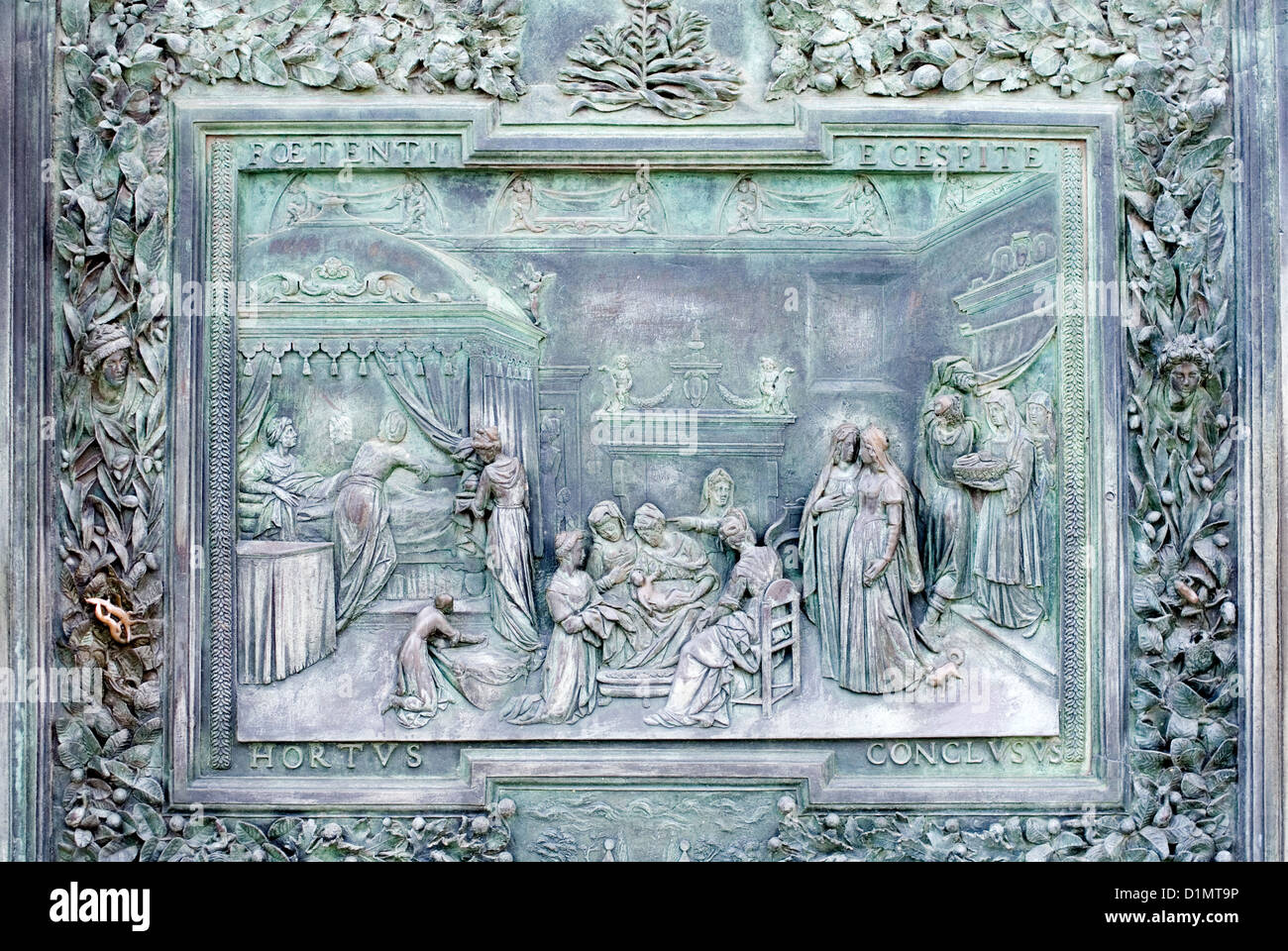 A bronze panel in the West front main door of Pisa Cathedral (Catedral de Pisa), Italy Stock Photo