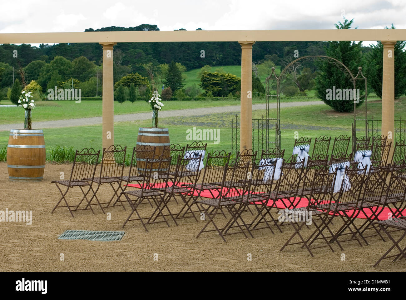 Chairs set out for an impending outdoor wedding Stock Photo