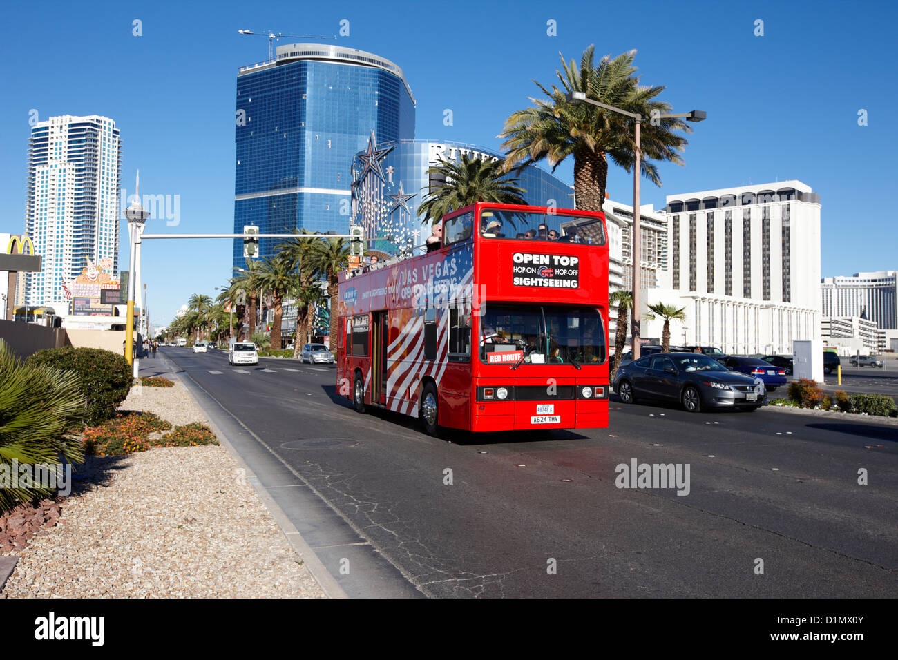 the hop on hop off red open top double deck bus on the Las Vegas strip Nevada USA Stock Photo
