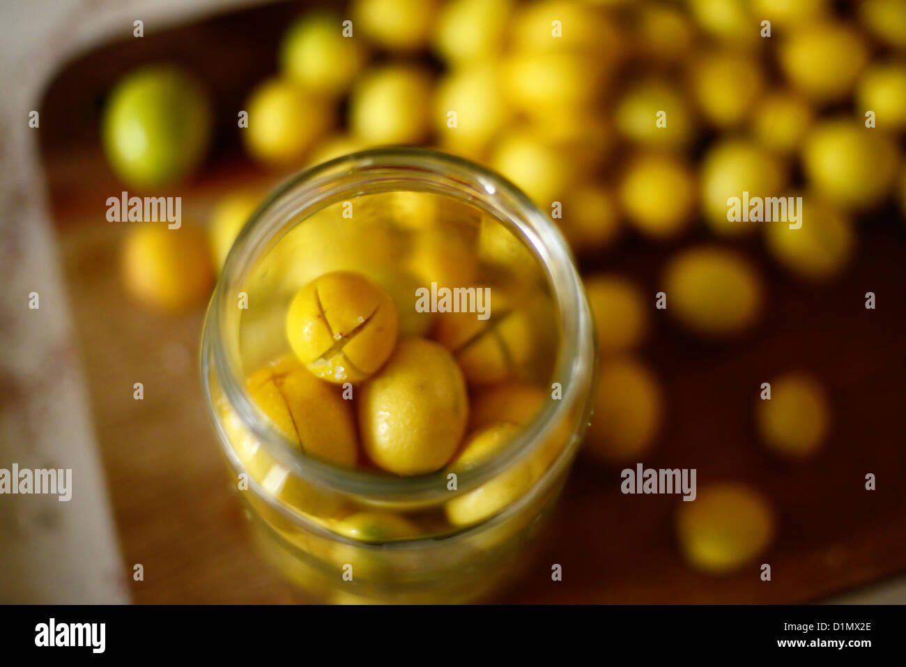 Home made olive curing. Cut olives are placed in a jar with brine Stock